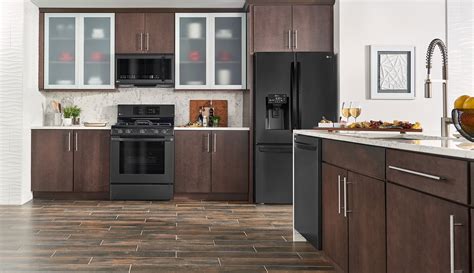 black stainless steel appliances with brown cabinets|black kitchen appliances colors.